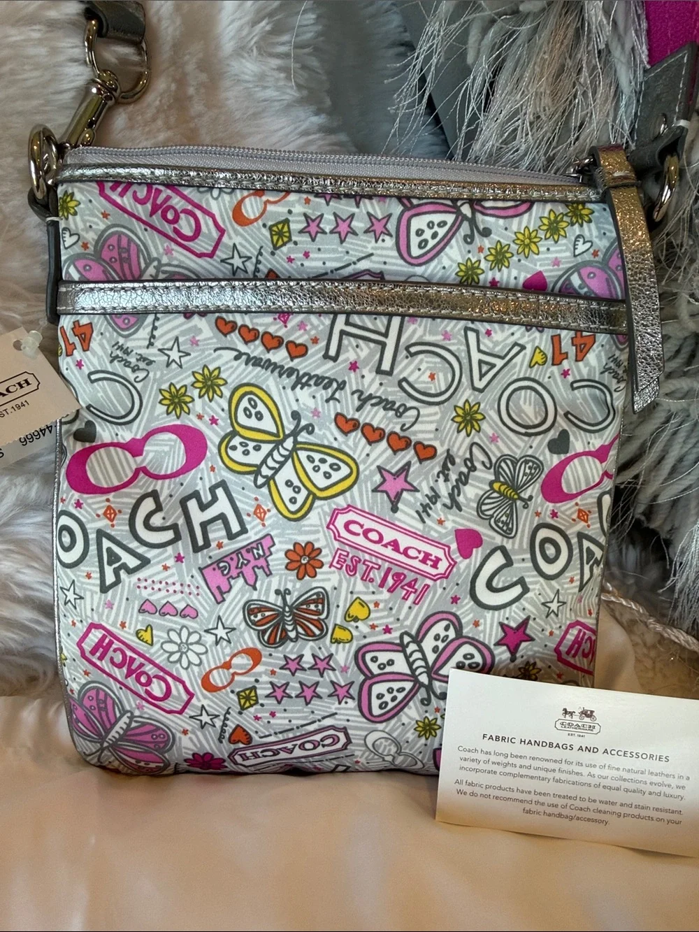 COACH Poppy graffiti swing pack